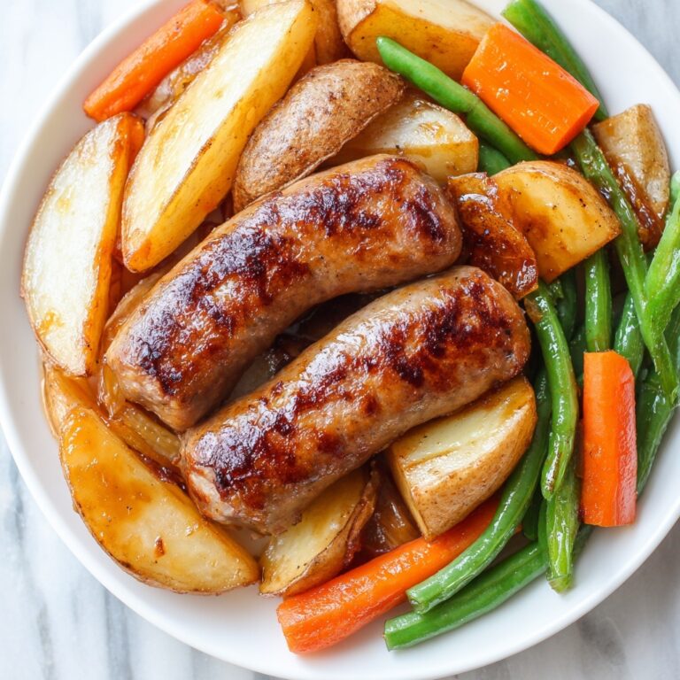 Beef Smoked Sausage with Onion and Bell Peppers over Rice Recipe